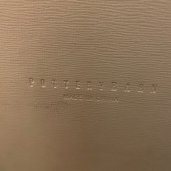 A set of two Pottery Barn cream leather jewelry boxes. - Picture 2 of 15